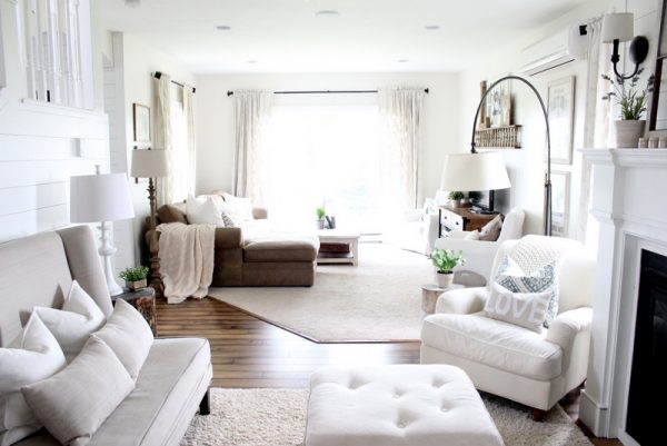 Love the layout of this long living room - separated by rugs and great furniture placement kellyelko.com