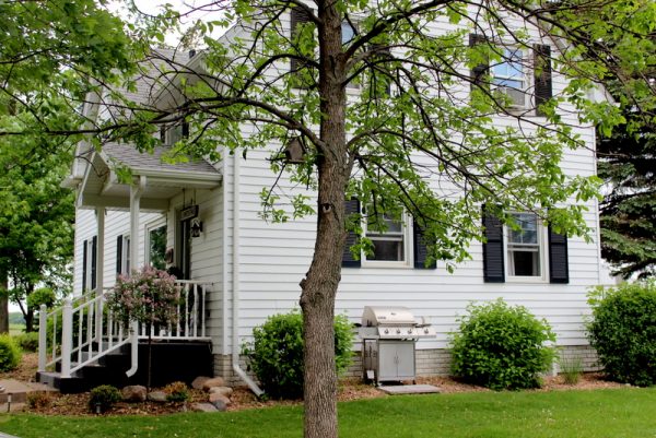 Charming white farmhouse with black shutters - tour the fabulous inside kellyelko.com