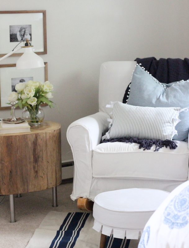 Cozy reading nook with DIY stump table kellyelko.com