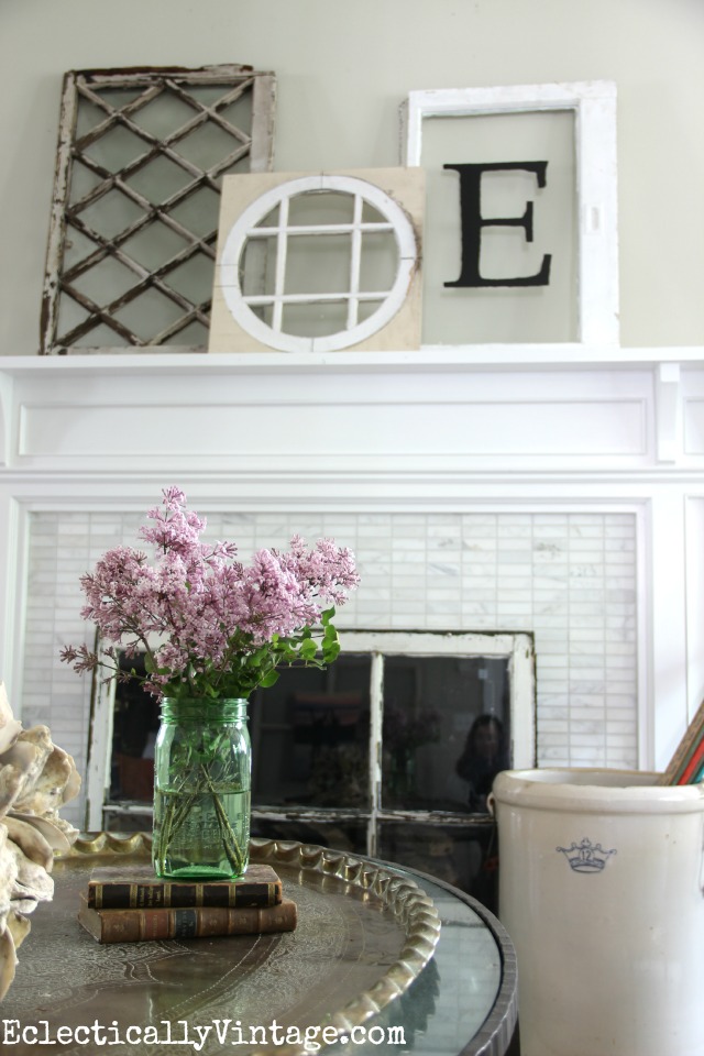 Love this antique window mantel and the window below used as a fireplace screen! kellyelko.com