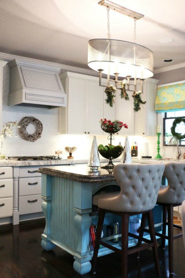 Love the white kitchen with a colorful blue island kellyelko.com