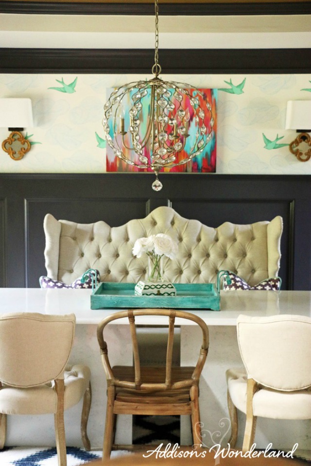 Love the mismatched chairs and settee in this dining room kellyelko.com