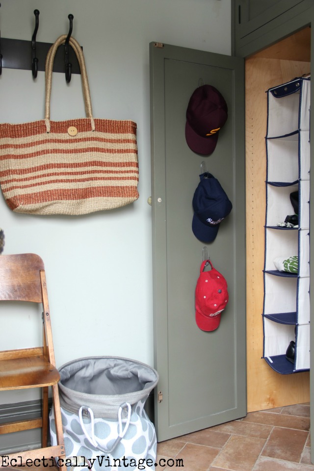 Make the most of unused behind the door space for hat organization kellyelko.com