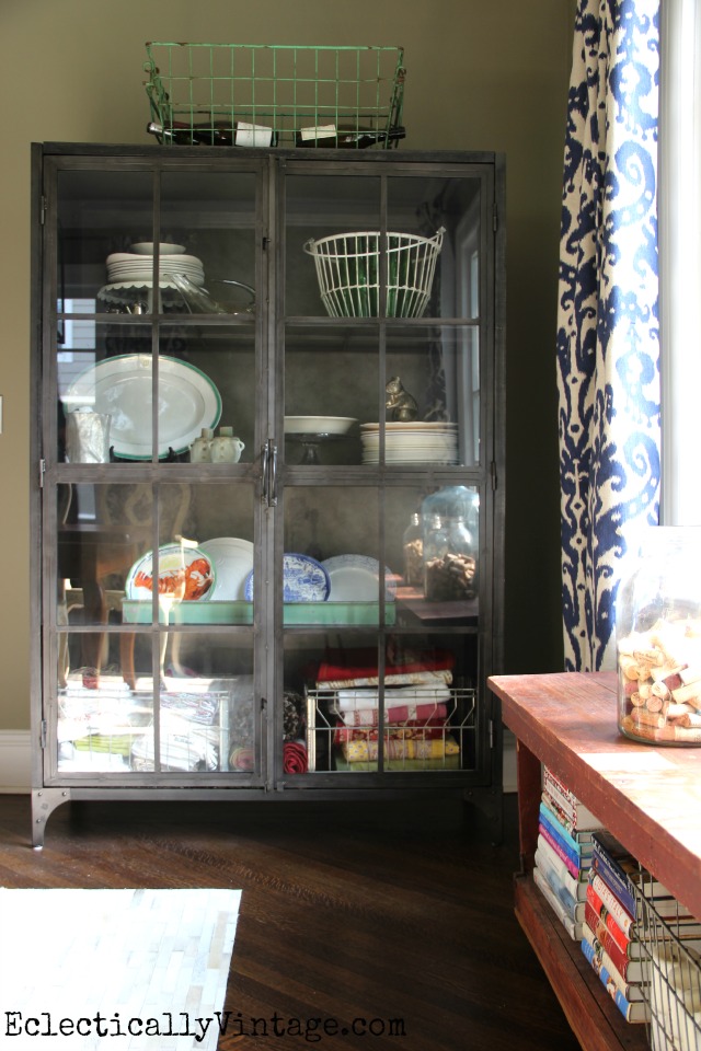 Love this eclectic dining room and the mix of styles including this metal industrial cabinet kellyelko.com