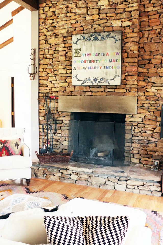 Eclectic Home Tour of Addison's Wonderland - love the stone fireplace kellyelko.com