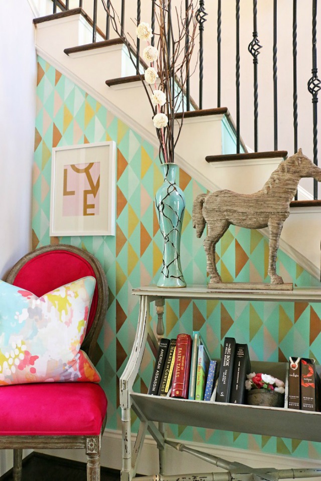 Create drama by stenciling a wall in a fun colorful and pattern kellyelko.com