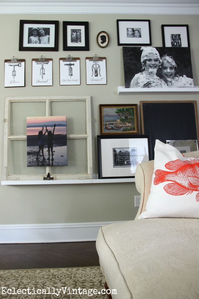 Love this eclectic picture ledge gallery wall kellyelko.com