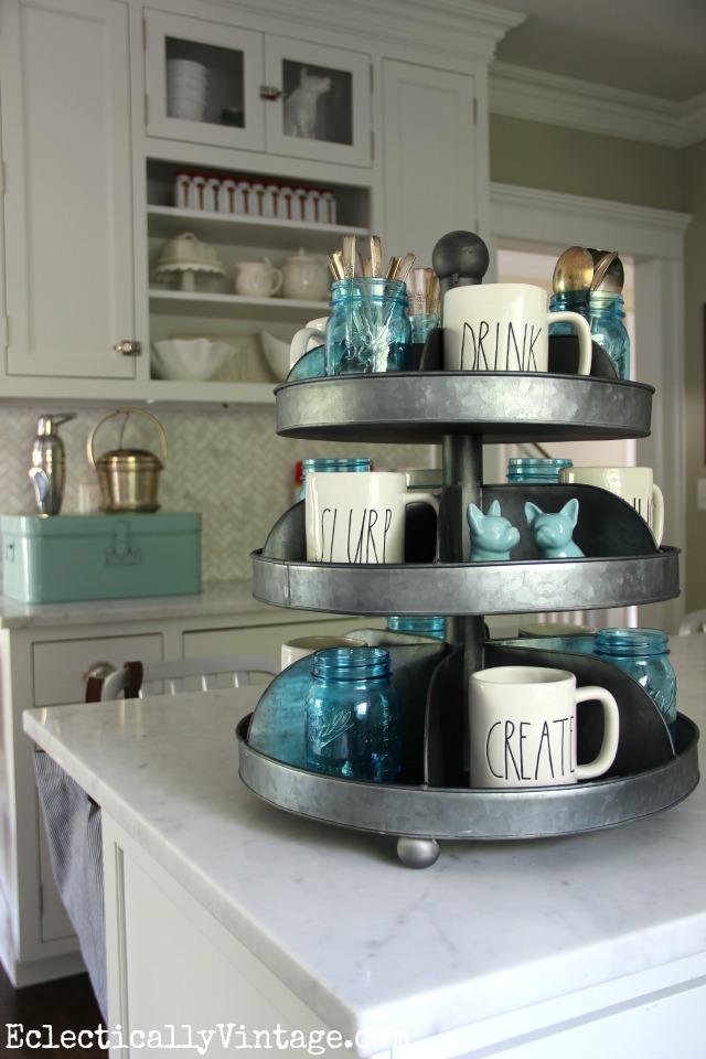 I LOVE this industrial hardware spinner as kitchen display in this gorgeous white kitchen kellyelko.com