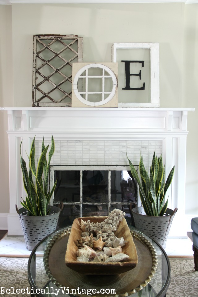 Love this mantel and the fun vintage finds including the old windows, vintage olive buckets and that huge old dough bowl kellyelko.com