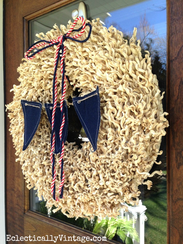 Love this patriotic wreath - it's easy to turn an ordinary every day wreath into something special for summer in a snap kellyelko.com