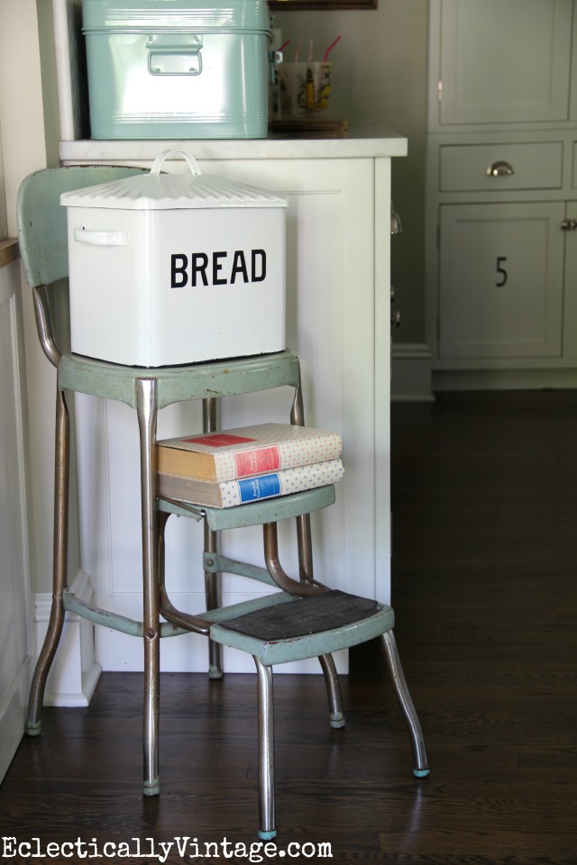 Love this kitchen - the old step stool with the bread box - such charming touches kellyelko.com