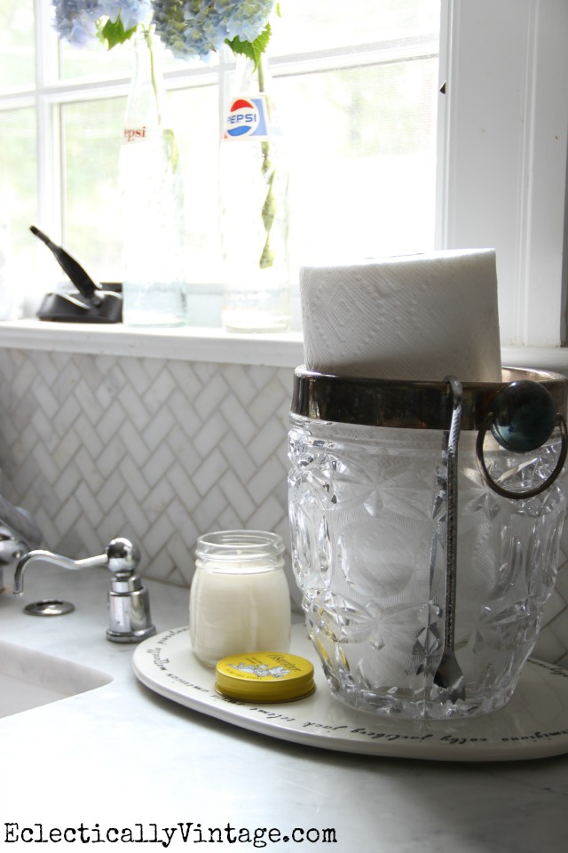 Love how she used a vintage ice bucket to hold paper towels kellyelko.com