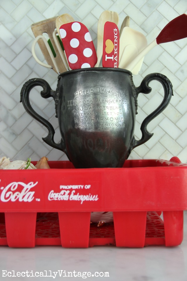 Love this vintage trophy used as a utensil holder kellyelko.com