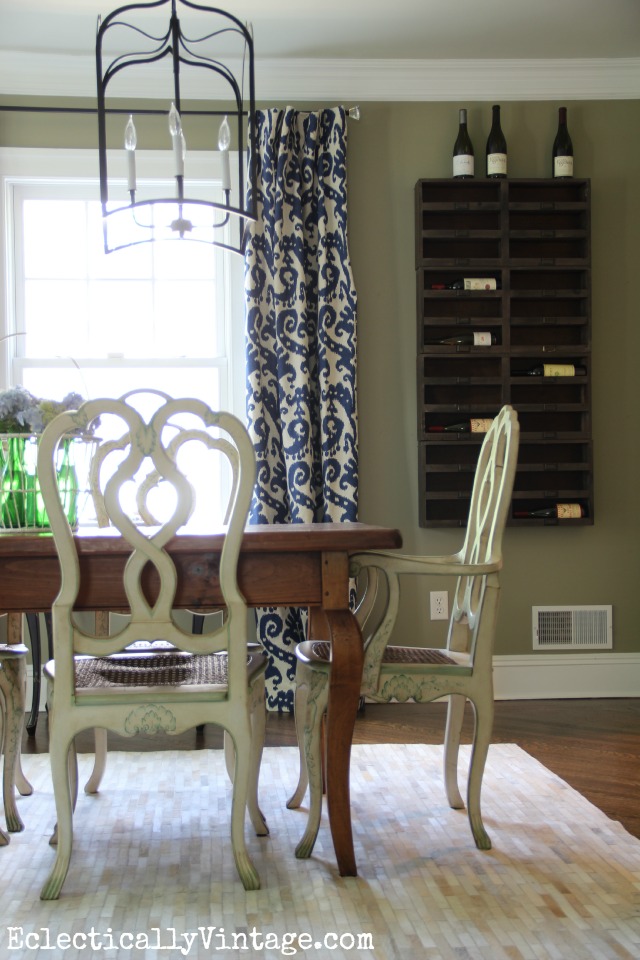 This dining room is stunning! Love the wine cubbies on the wall, the double lanterns and the farmhouse furniture kellyelko.com