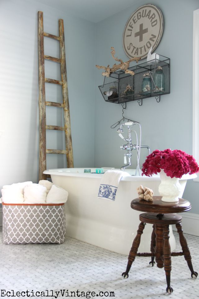 Love the details in this master bathroom - the carrara marble floors and the free standing bathtub kellyelko.com