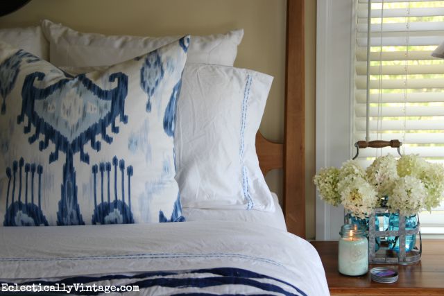 Love this blue ikat pillow and bedding kellyelko.com