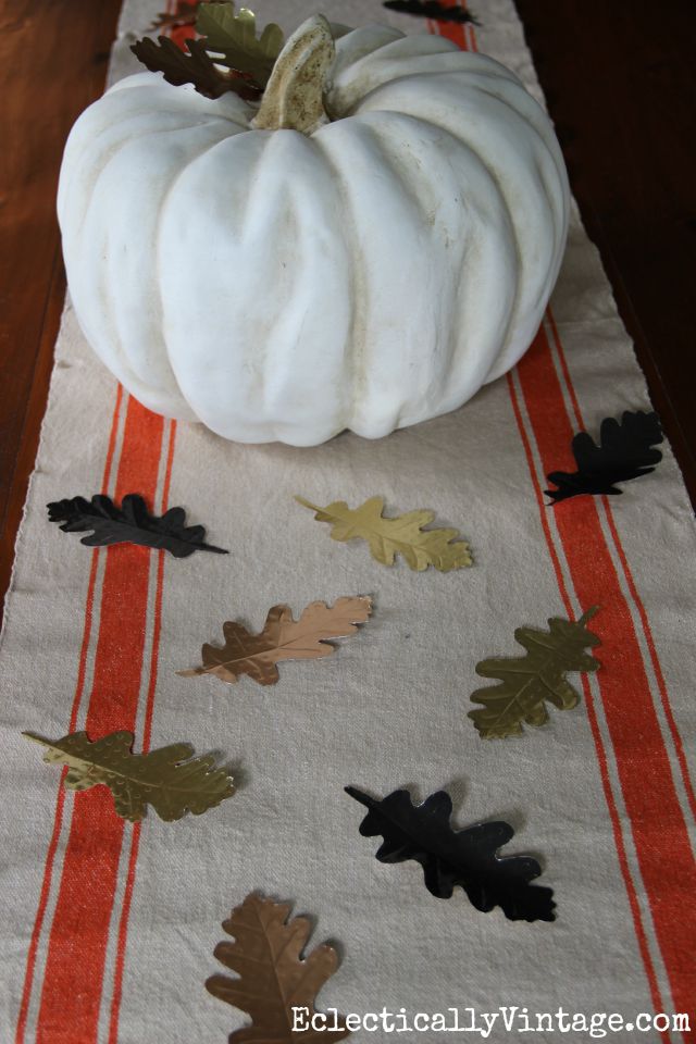 Love this fall centerpiece - she made these DIY embossed metal leaves and it seems so easy! kellyelko.com