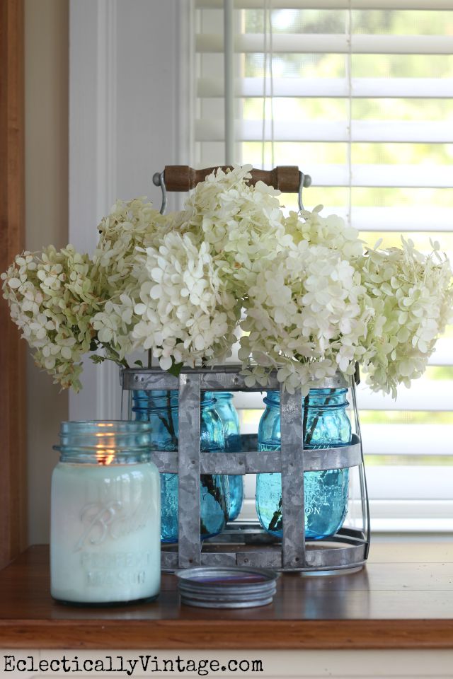 Love these Limelight hydrangeas in blue mason jars kellyelko.com