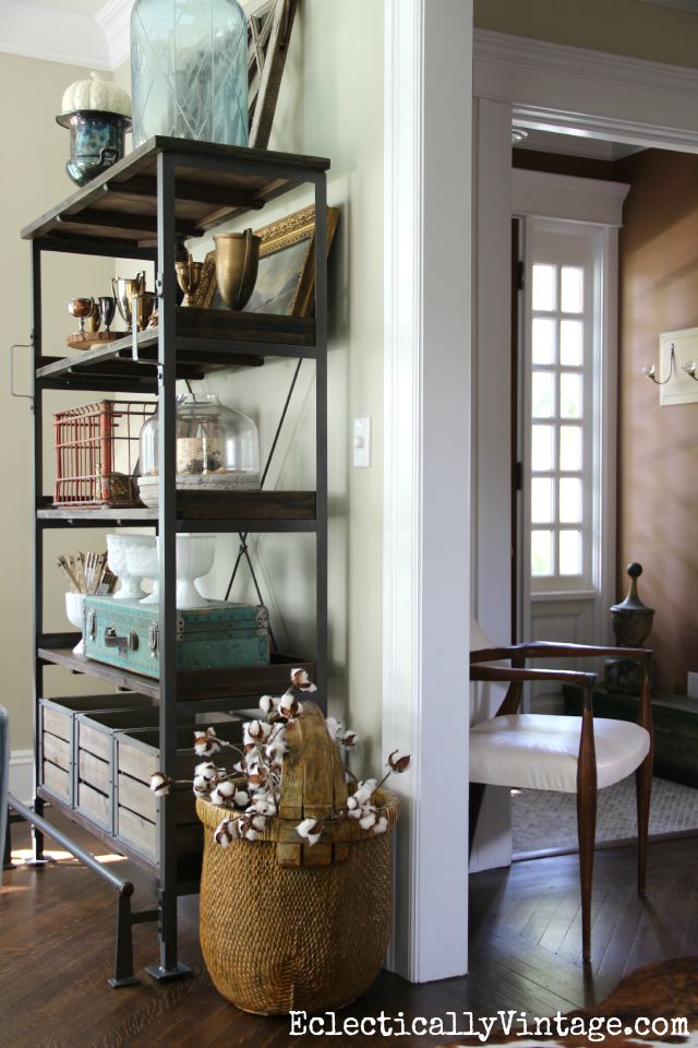 Love these open shelving and all of the beautiful finds so artfully arranged kellyelko.com