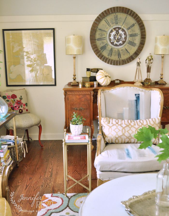 Bohemian vintage living room - love the hand painted chair! 