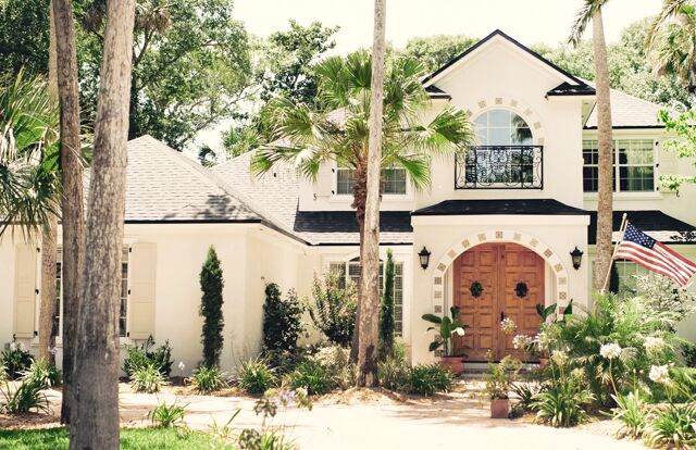 Spanish style house tour - love the double carved front doors kellyelko.com