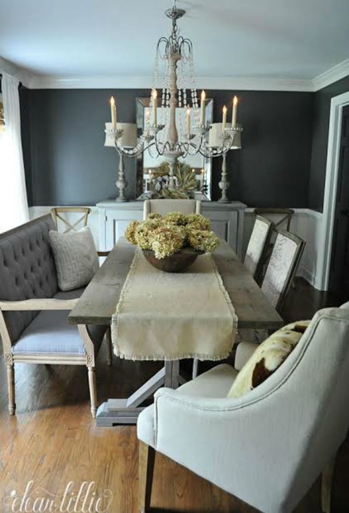 Love the dramatic gray walls in this beautiful dining room 