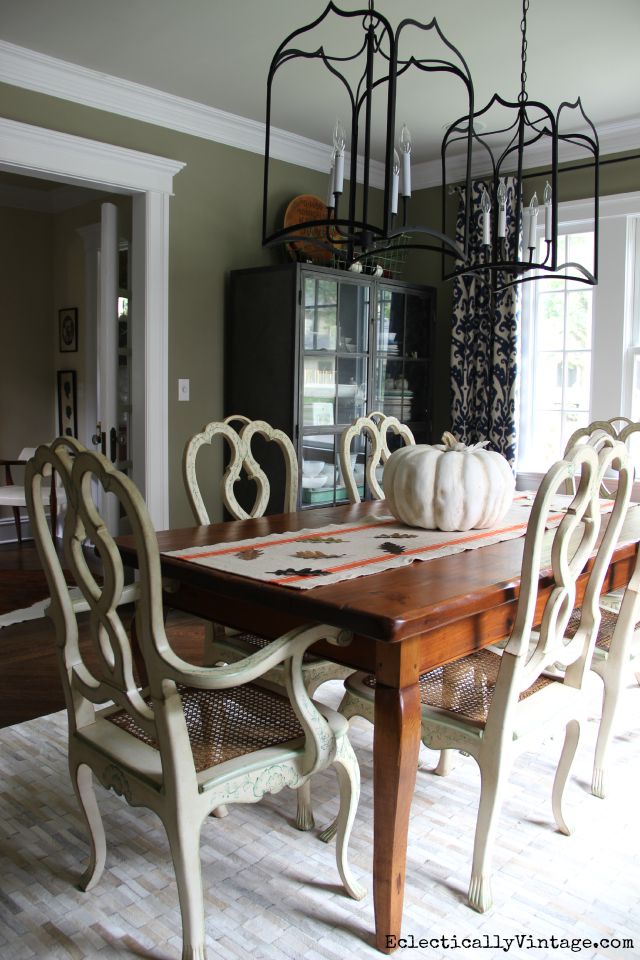 Fall dining room - love the orange table runner and the double lanterns kellyelko.com