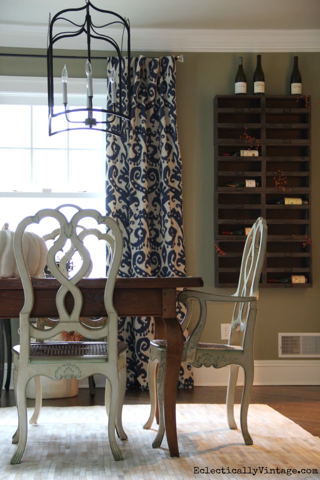 Love the wine cubbies in this eclectic dining room kellyelko.com