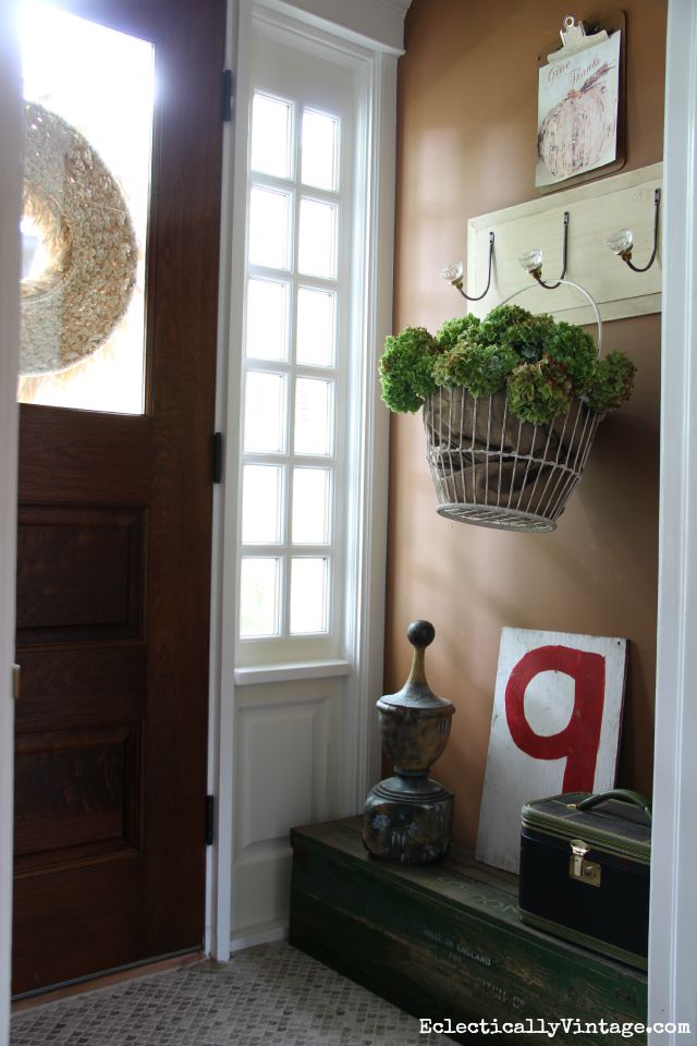 Entry with a welcoming basket of dried hydrangeas kellyelko.com