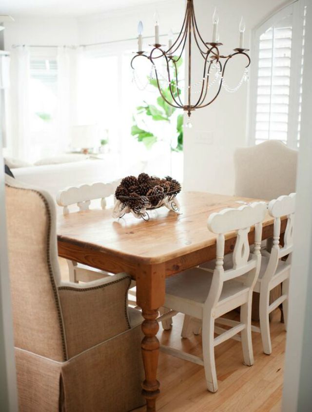 Farmhouse kitchen table and mismatched chairs 