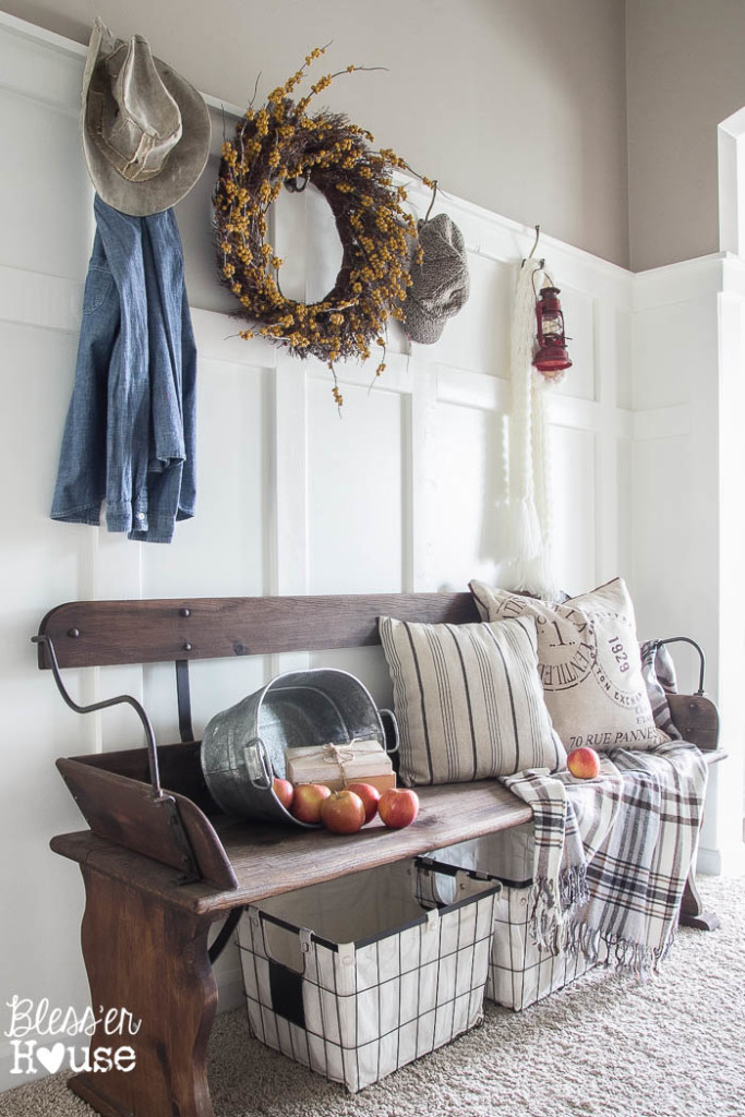 Love this foyer and the rustic bench 