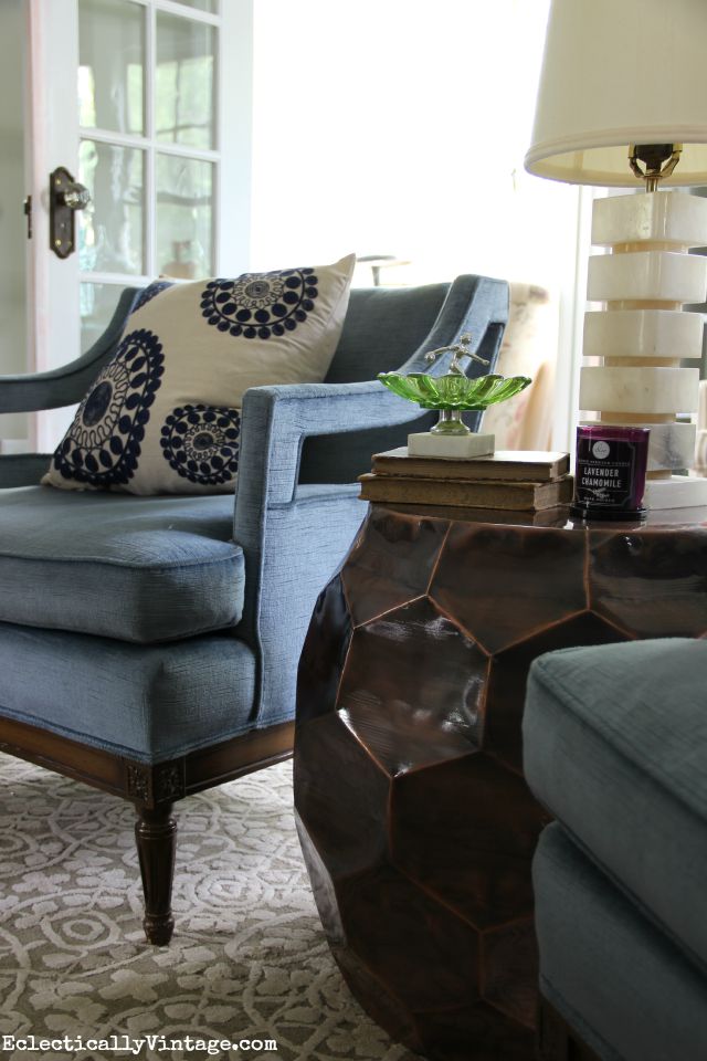 Love these blue mid century club chairs and that bronze accent table kellyelko.com