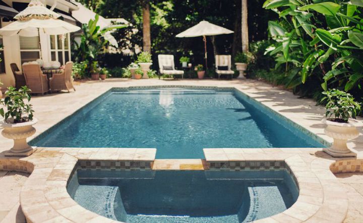 Tropical oasis backyard with beautiful pool 