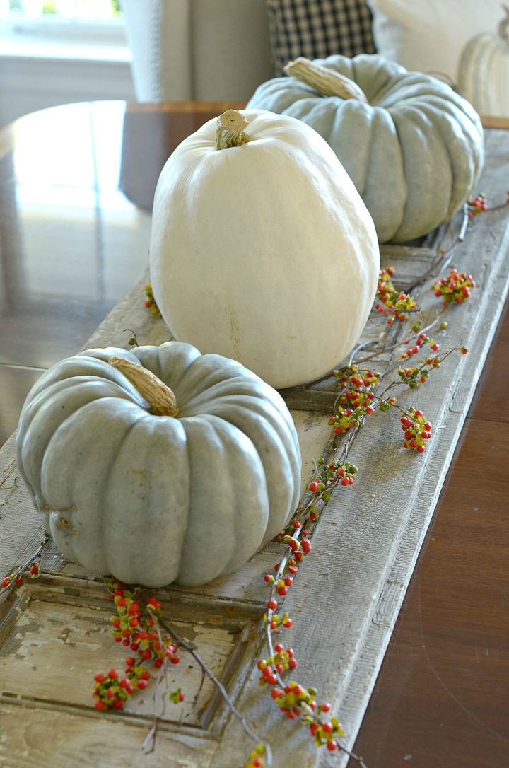 Such creative pumpkin decorating ideas - love this pumpkin centerpiece 