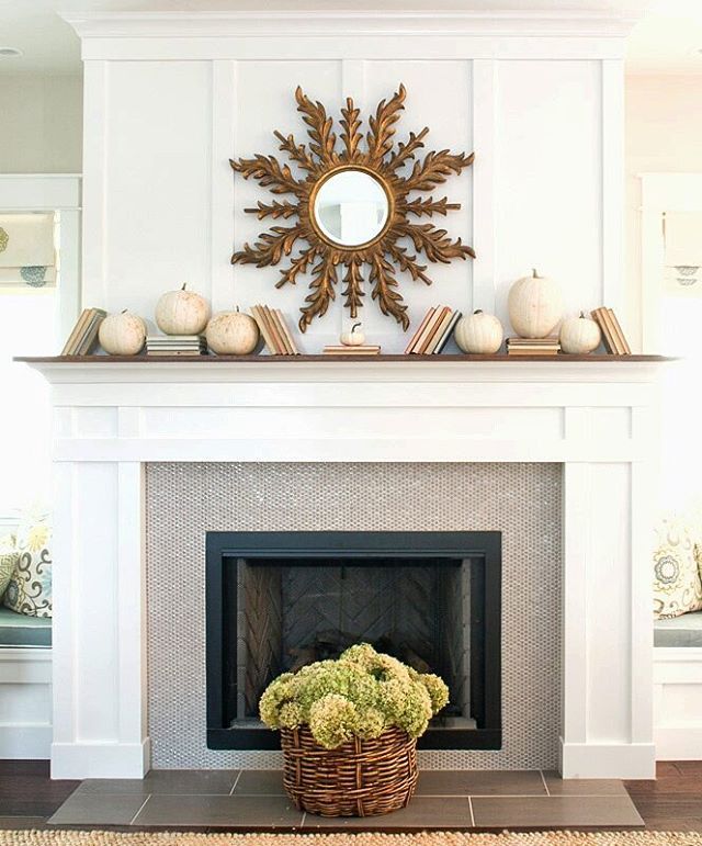 Love this whimsical mantel of white pumpkins and stacked books kellyelko.com