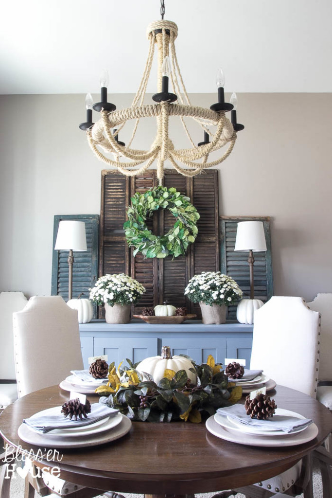 Farmhouse dining room - love the old shutters and the DIY rope chandelier