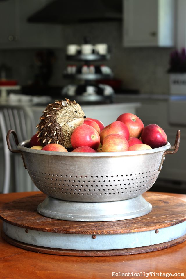 Vintage colander filled with apples makes a simple centerpiece kellyelko.com