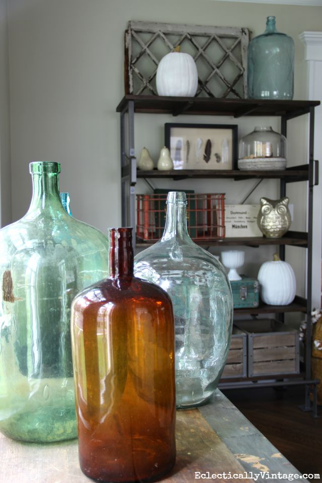 Vintage demijohn look beautiful near a window kellyelko.com