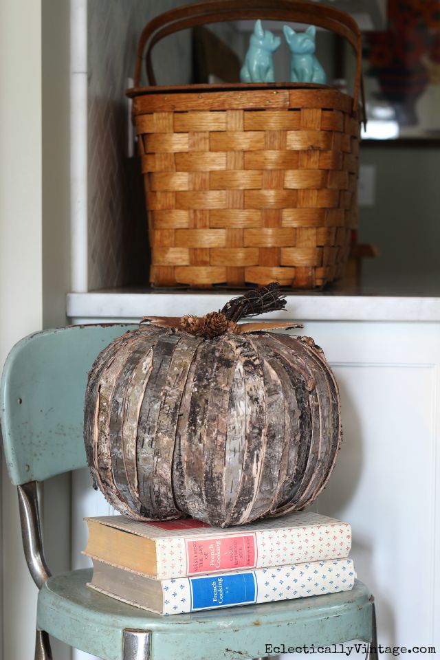 Wood bark pumpkin - so cute on a stack of vintage cookbooks kellyelko.com