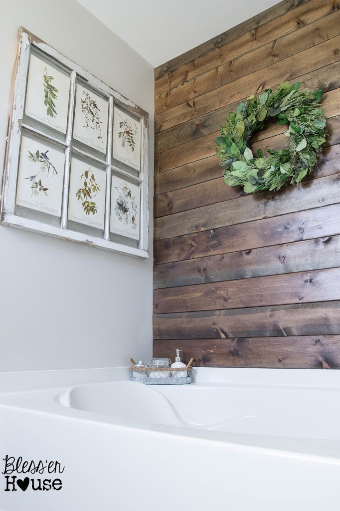 Wood plank bathroom wall really warms up the room 