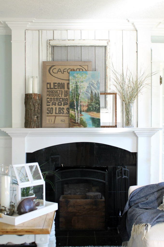 Love this layered fall mantel - the burlap art and the vintage landscape 