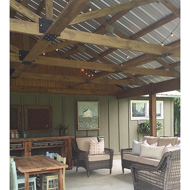 Covered farmhouse porch - love the metal room and the exposed beams kellyelko.com