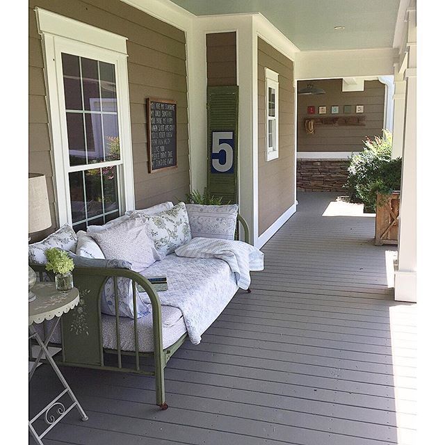 Farmhouse porch - love the daybed kellyelko.com