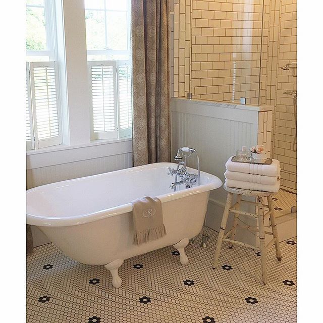 Vintage bathroom - love the black and white mosaic tile and the claw foot tub kellyelko.com