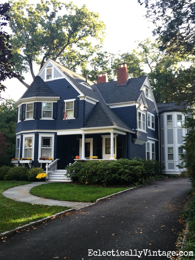 Fall Curb Appeal - 18 stunning homes with ideas to copy. Love this blue house and the window boxes filled with colorful mums kellyelko.com