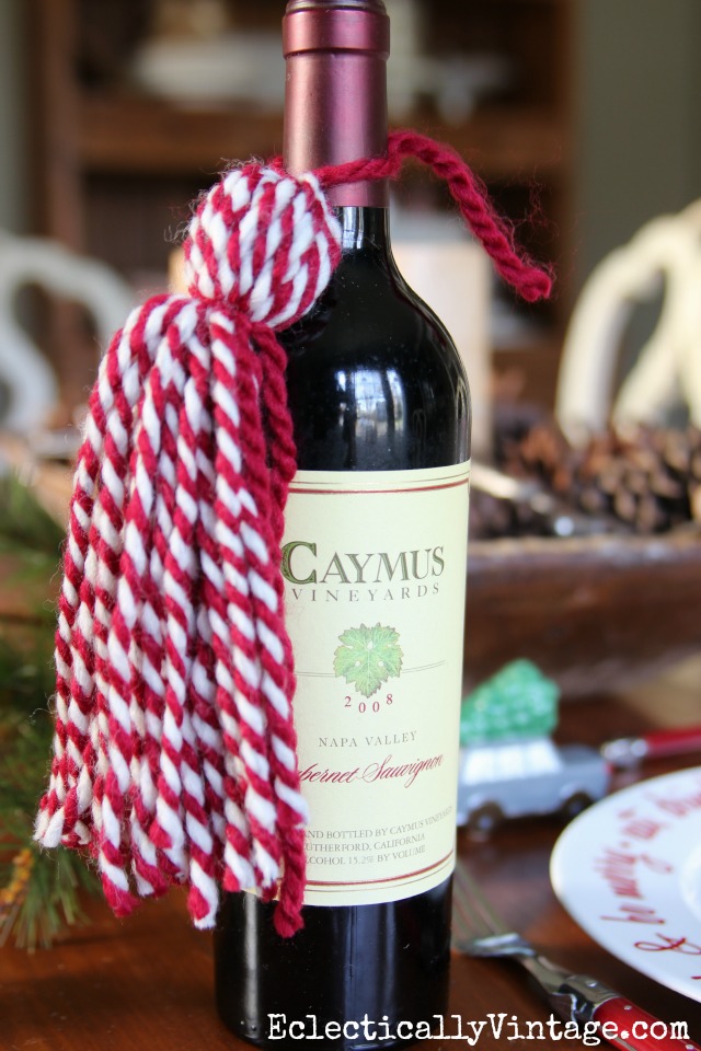 DIY Yarn Tassels - love them tied to a bottle of wine for a fun hostess gift! kellyelko.com