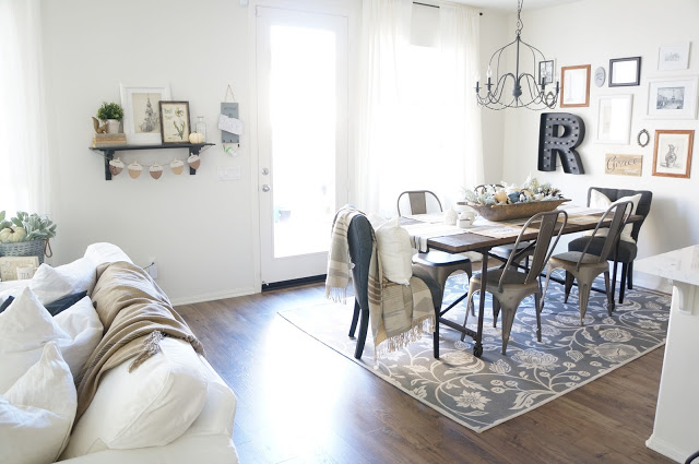 Love the open floor plan of this dining room/living room kellyelko.com