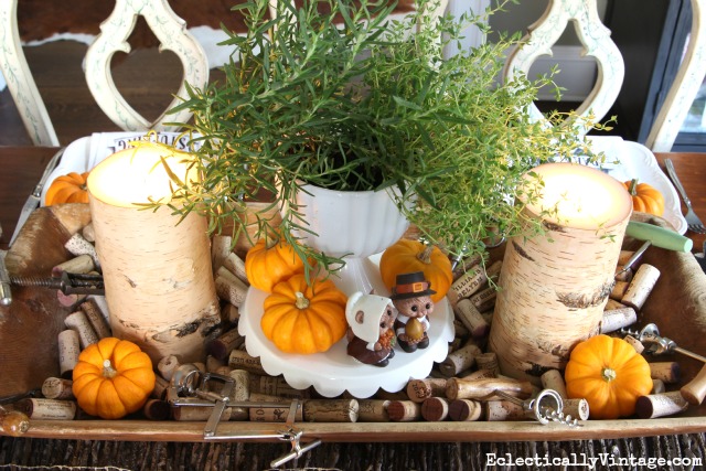 Dough bowl centerpiece - love the cork filler and vintage corkscrews and herbs kellyelko.com