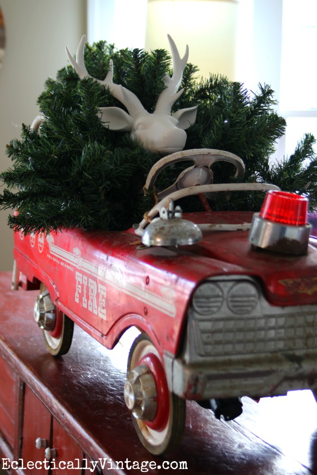 Cute! Vintage toy fire truck carrying a Christmas tree kellyelko.com