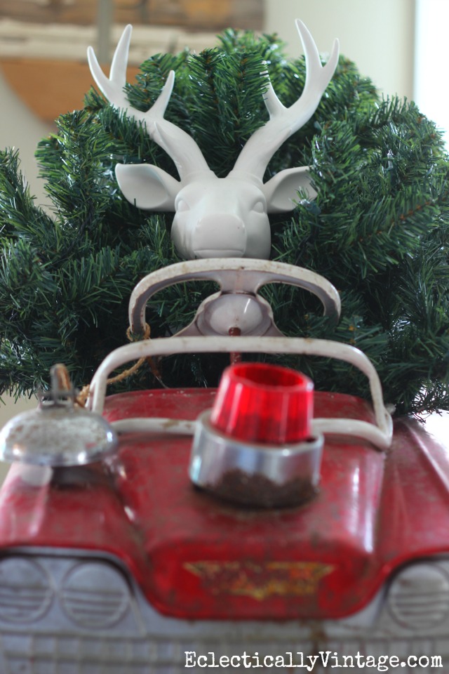 Deer driving red car carrying Christmas tree - watch out! kellyelko.com